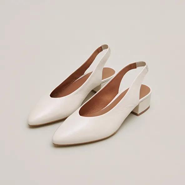 Ballet flats with open backs in ecru distressed leather